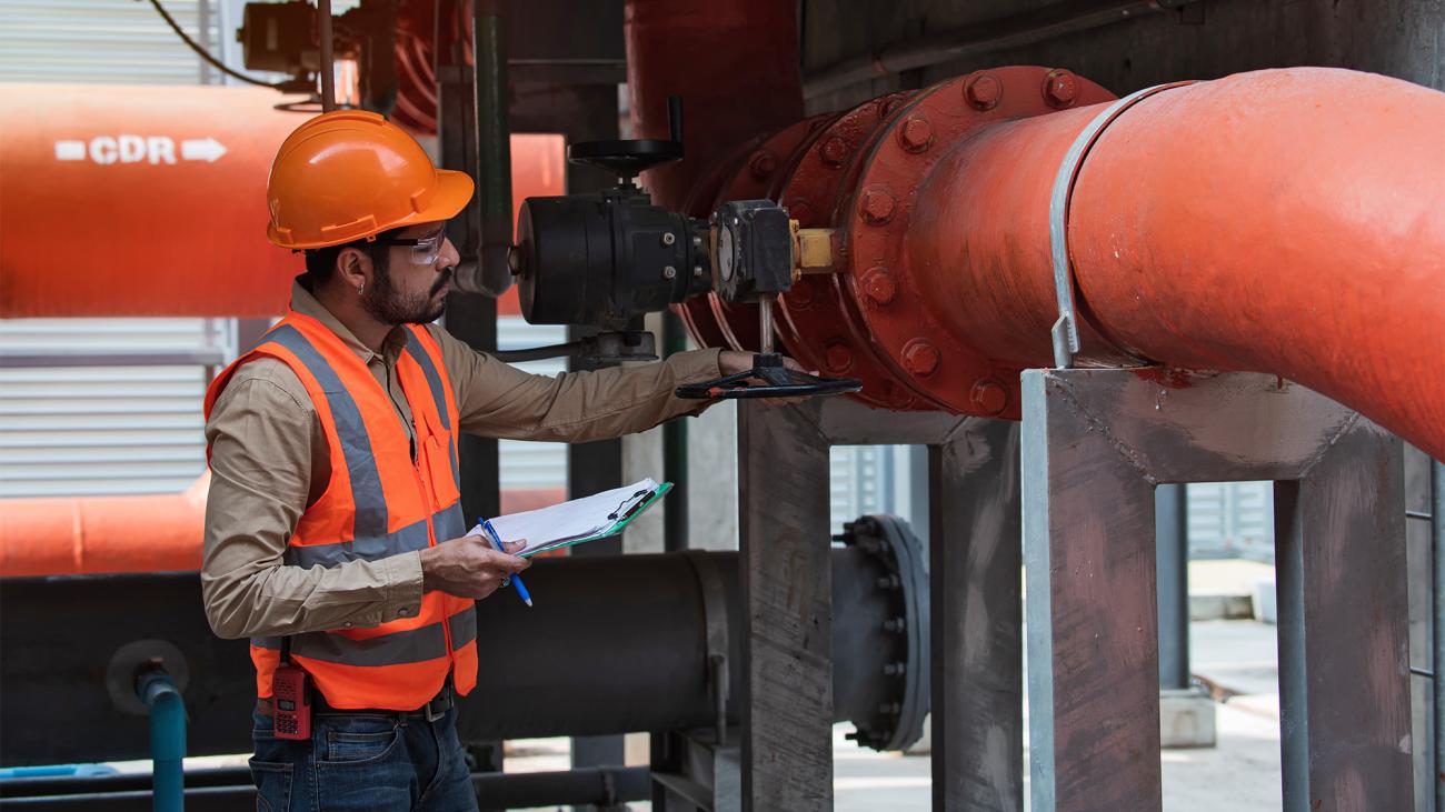 Engineer checking industry cooling tower air conditioner